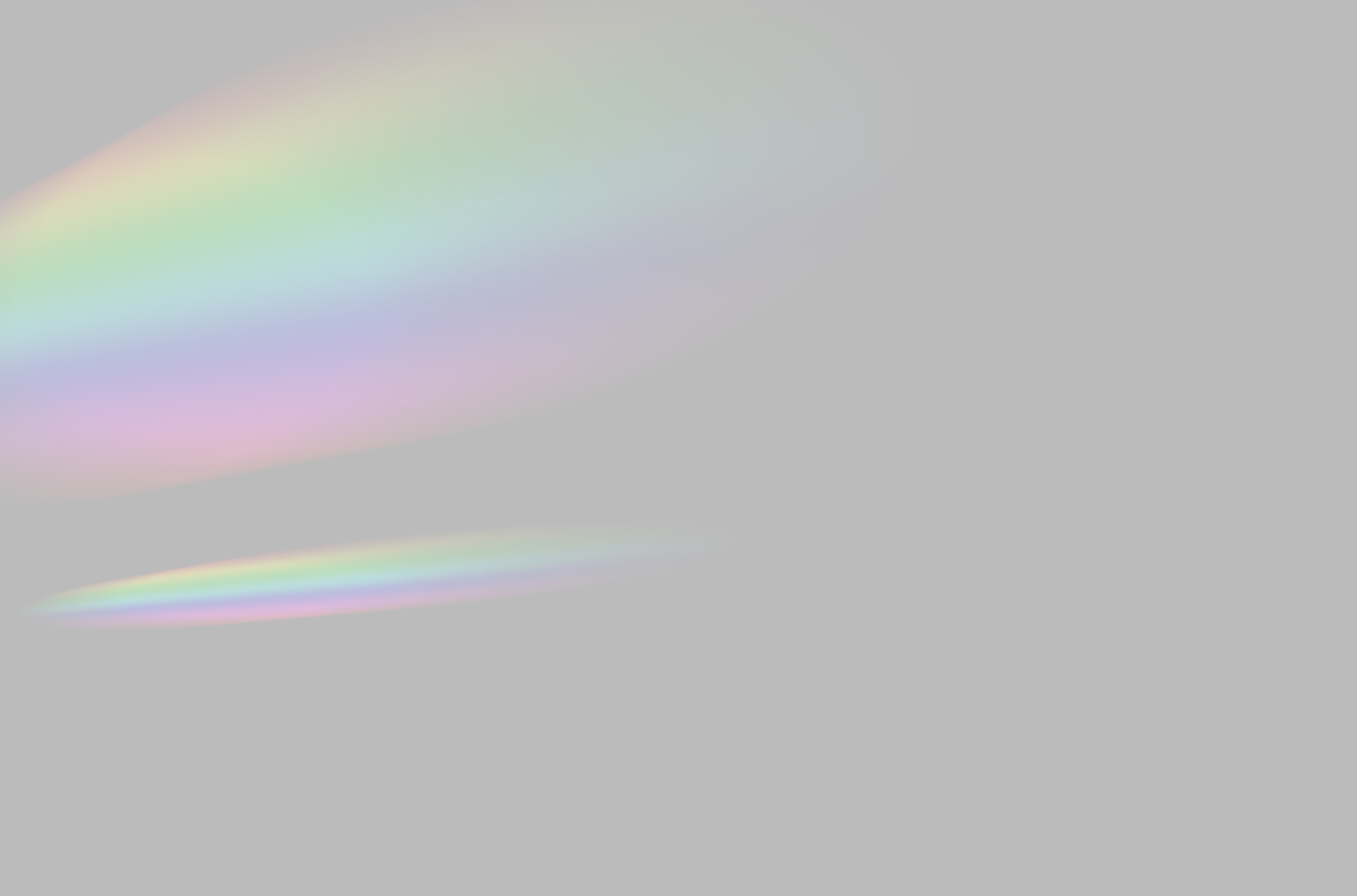 Blurred Rainbow Prism Light Overlay on Grey Background